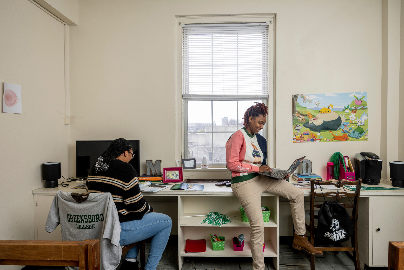 Greensboro College students studying in dorm room