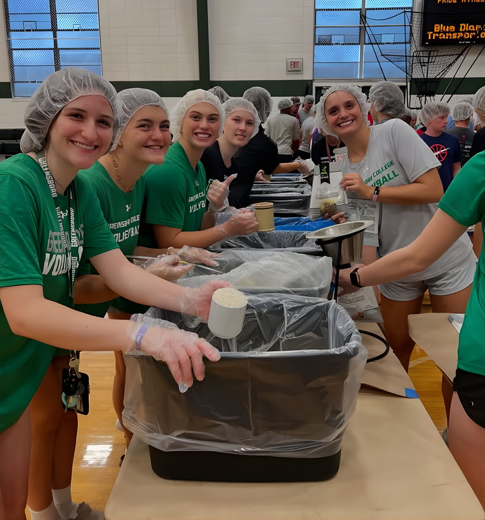 Greensboro College Students volunteering in the local community