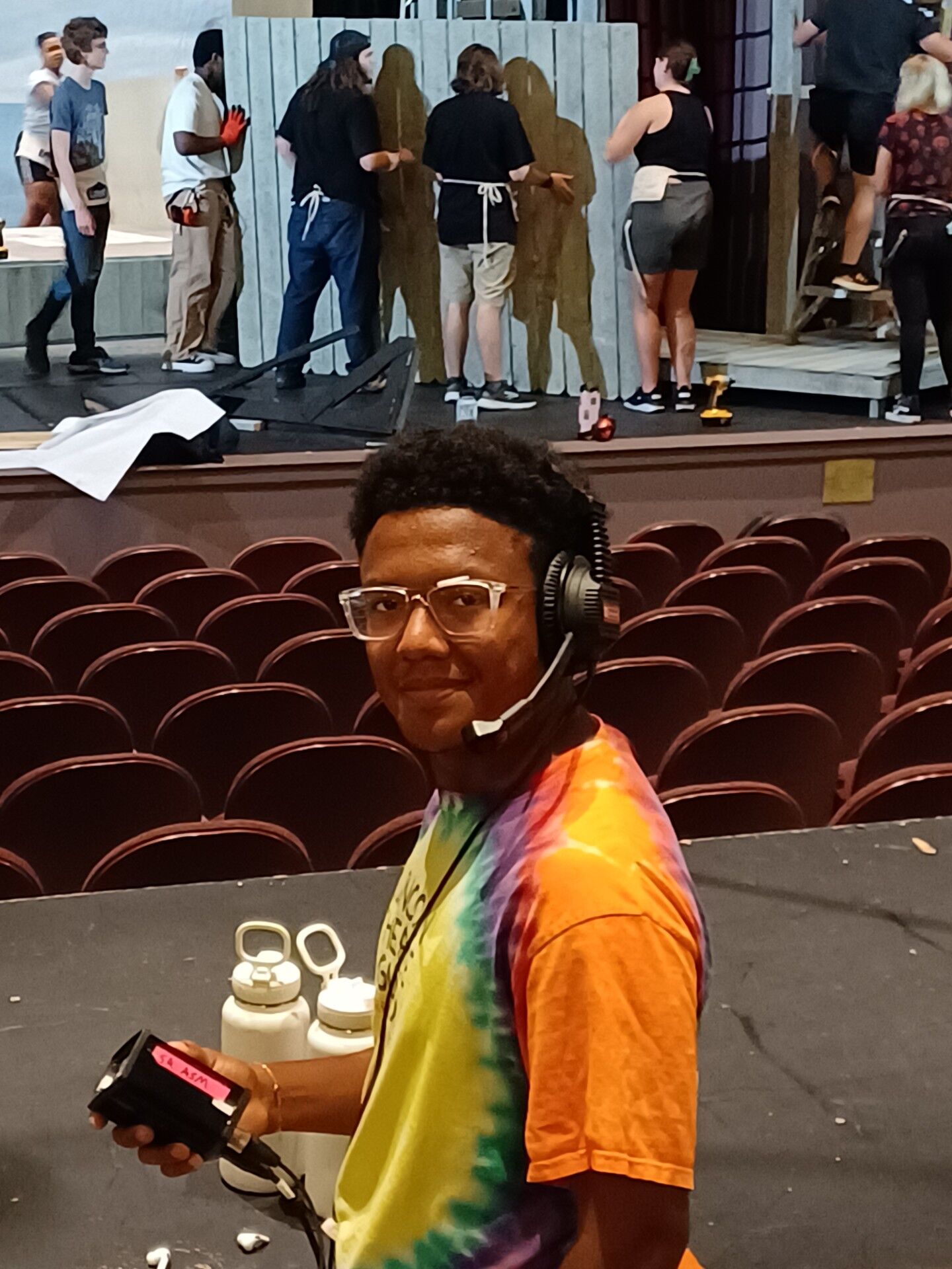 Greensboro College student working behind the scenes in theater.