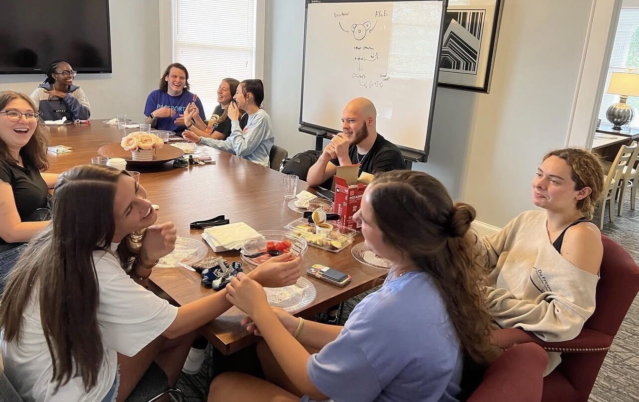 Greensboro College honors students having a discussion.