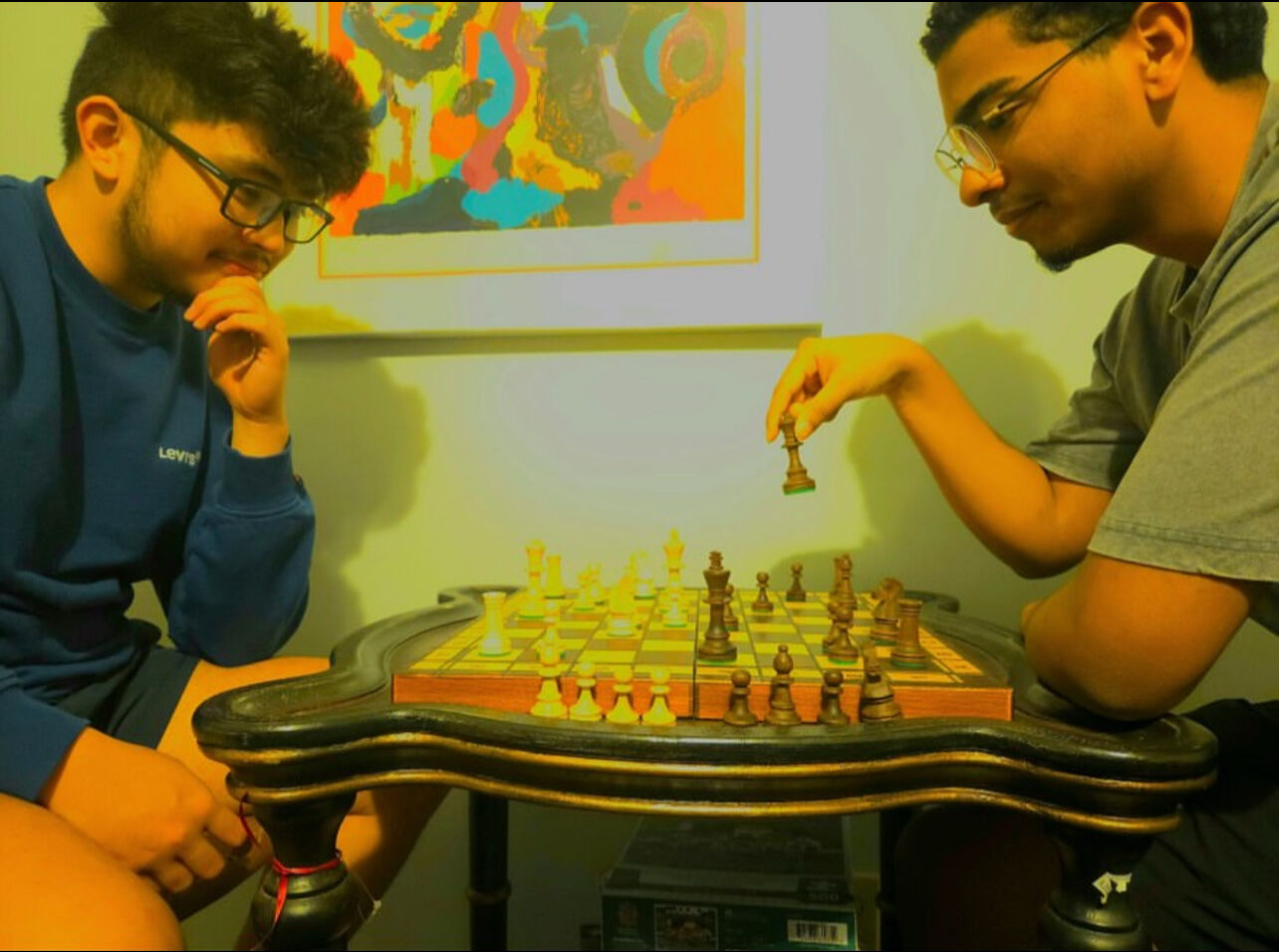 Greensboro College honors students playing chess.