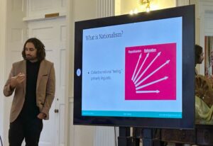 Greensboro College honors student giving a presentation.