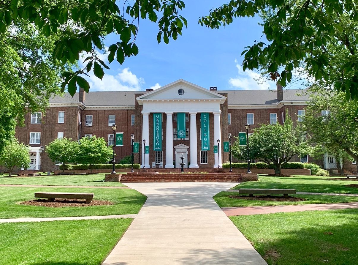 Greensboro college main campus with trees.